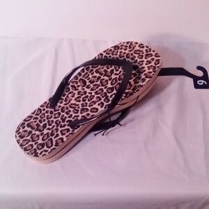 Leopard printed flip flops